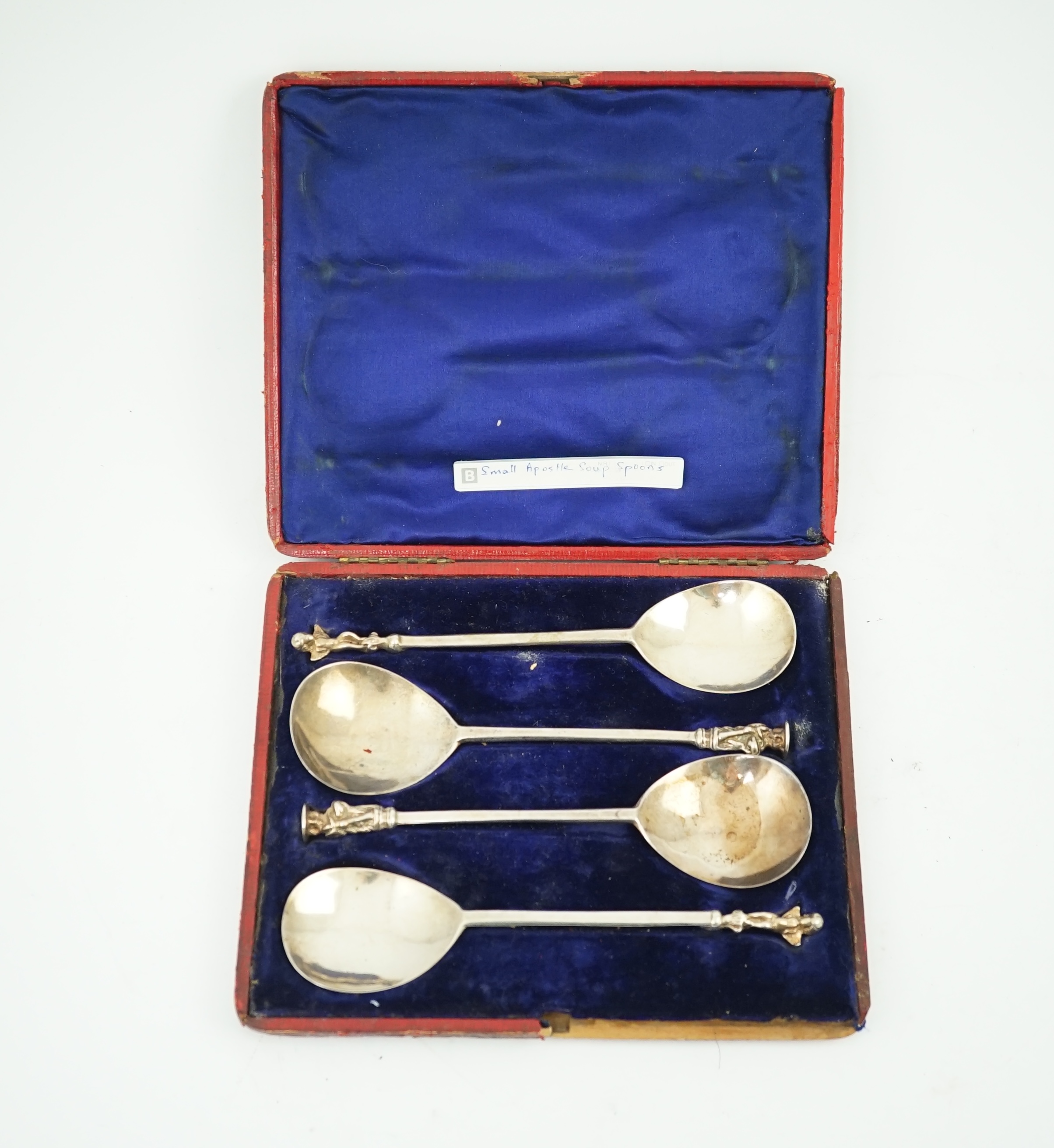 Four cased 18th century silver spoons